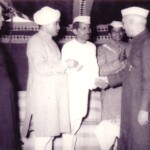 Babuji shaking hands with Nehru (1952-53)